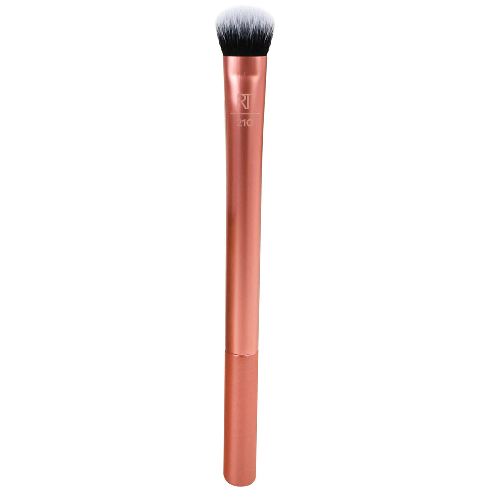 Real Techniques Expert Concealer Brush with ultra plush bristles for precise coverage.