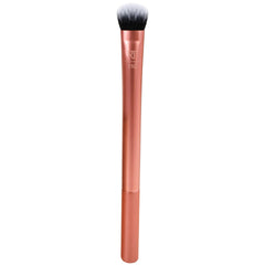 Real Techniques Expert Concealer Brush with ultra plush bristles for precise coverage.