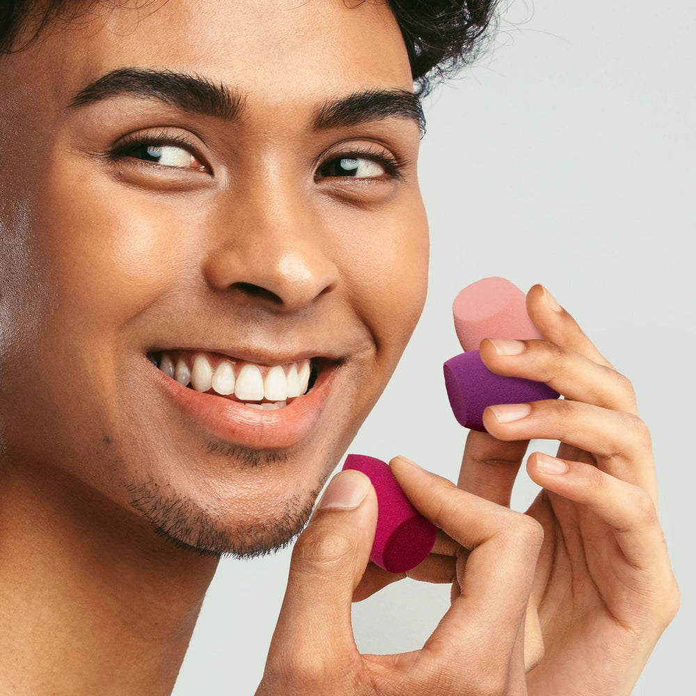 Real Techniques Mini Miracle Sponge with travel case for on the go touch ups.