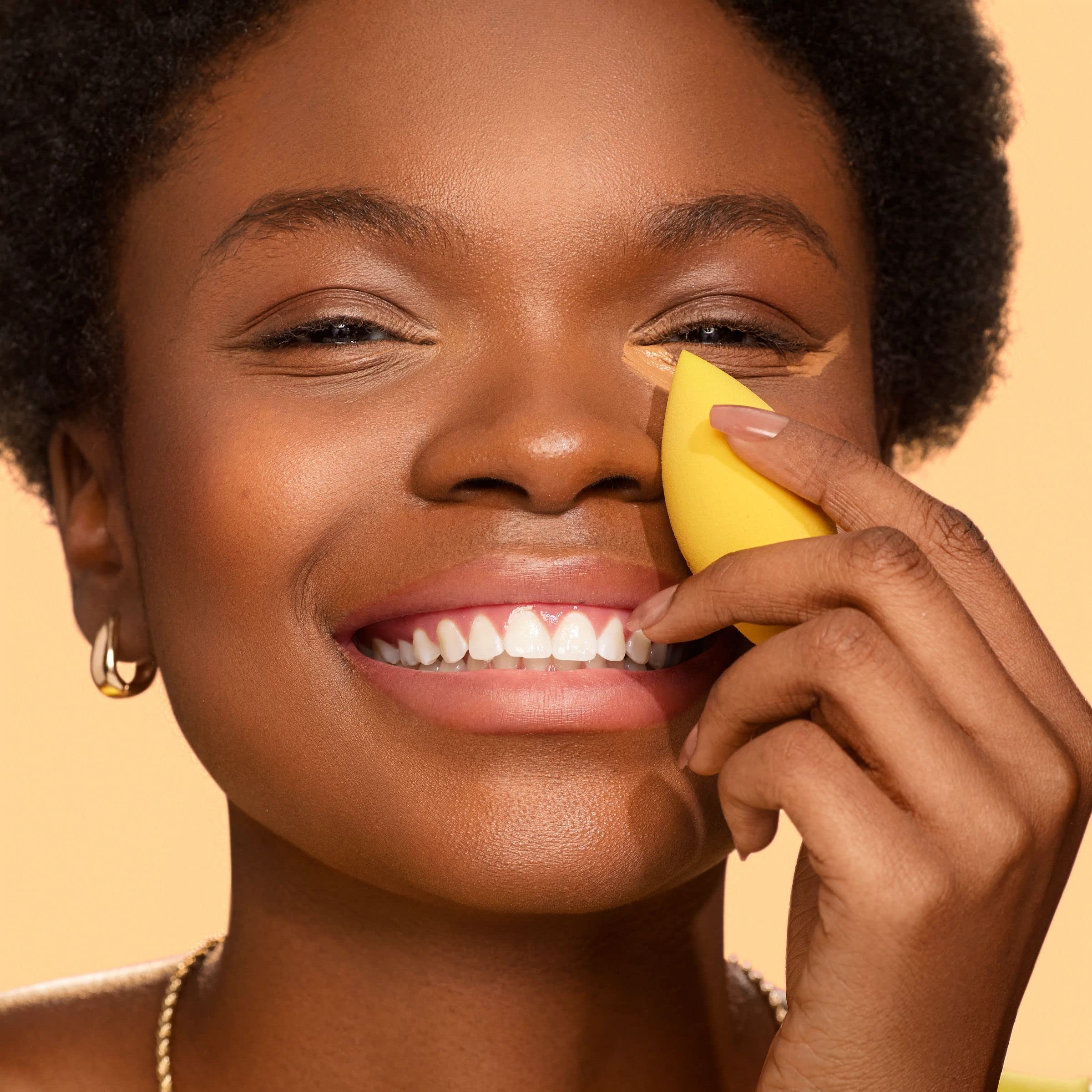 Real Techniques Miracle Concealer Sponge works with cream concealer for precise coverage.