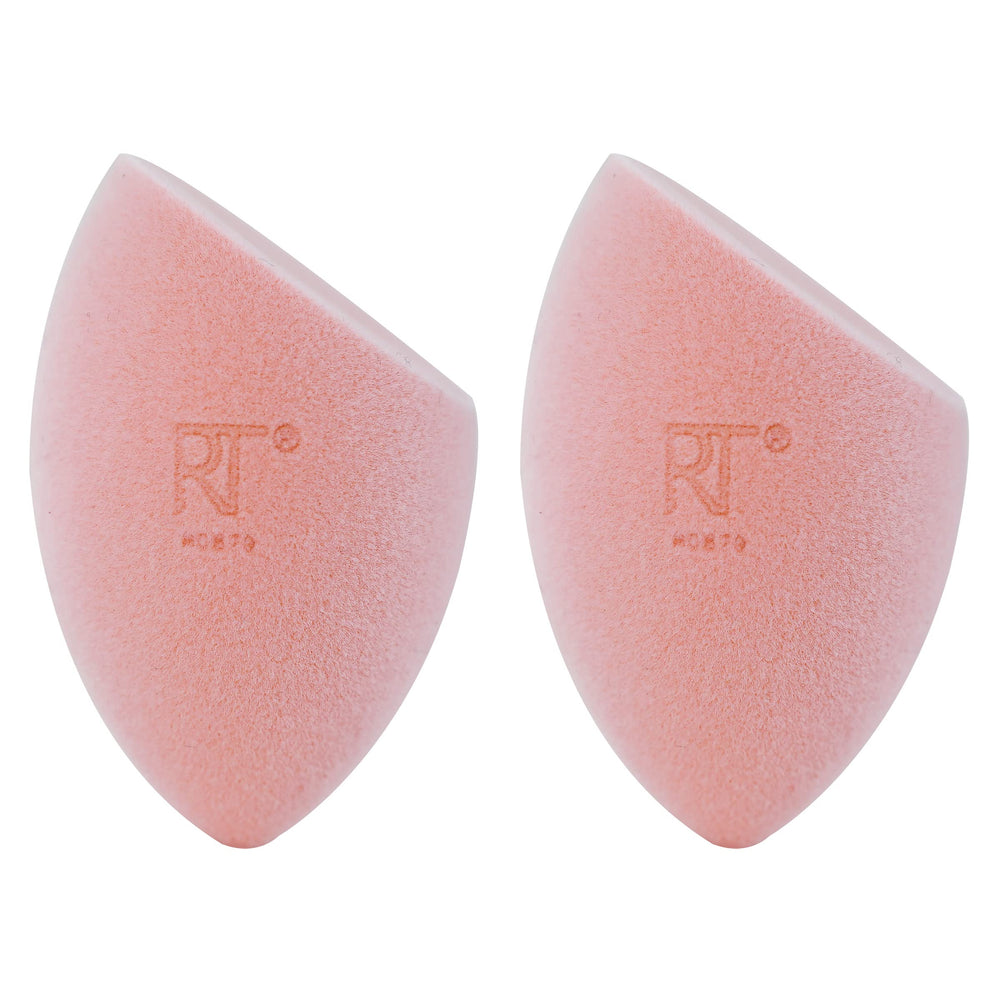 Real Techniques Miracle Powder Sponge flat-edge for packing on product evenly.