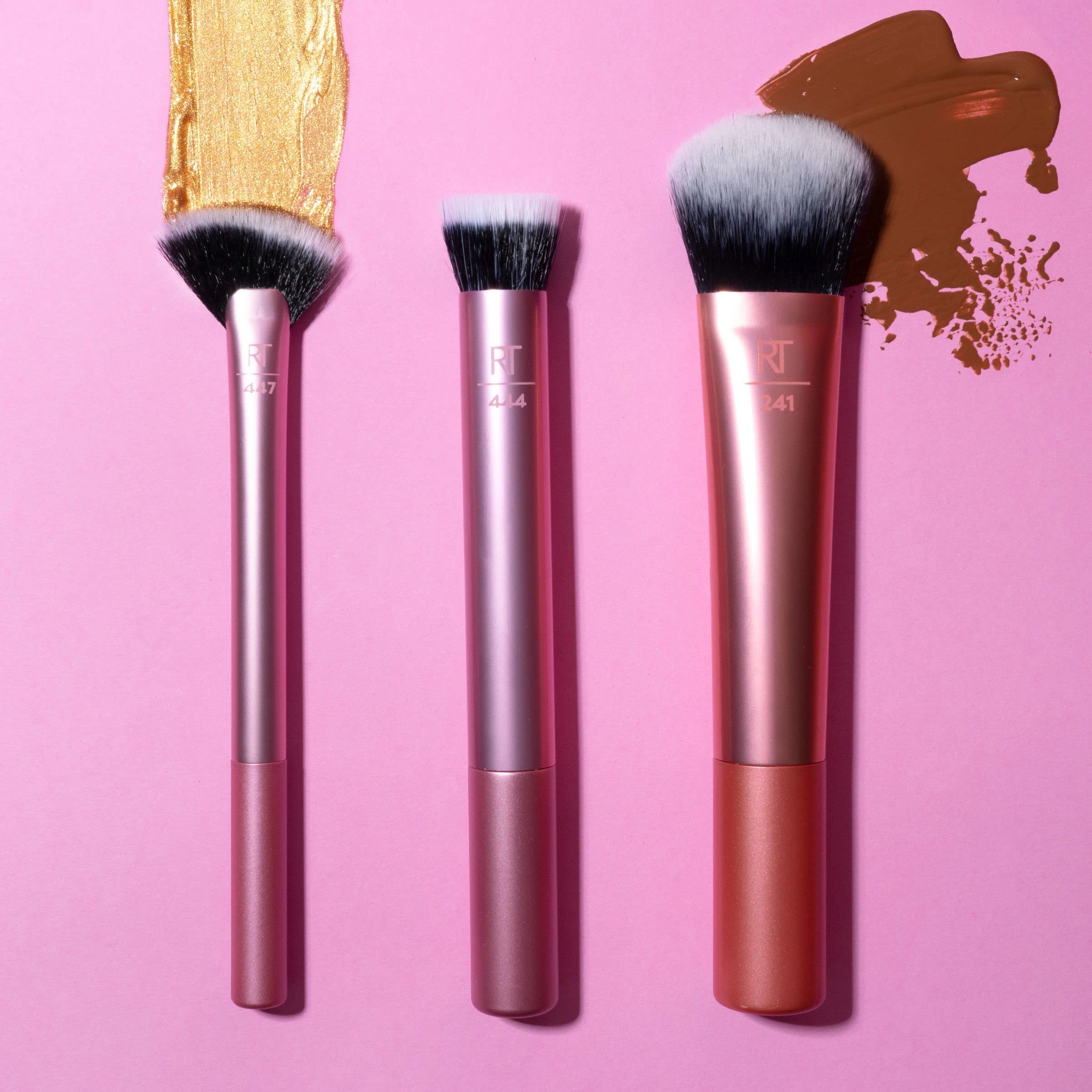 Real Techniques Seamless Complexion Brush in hand for quick touch-ups during daily routine