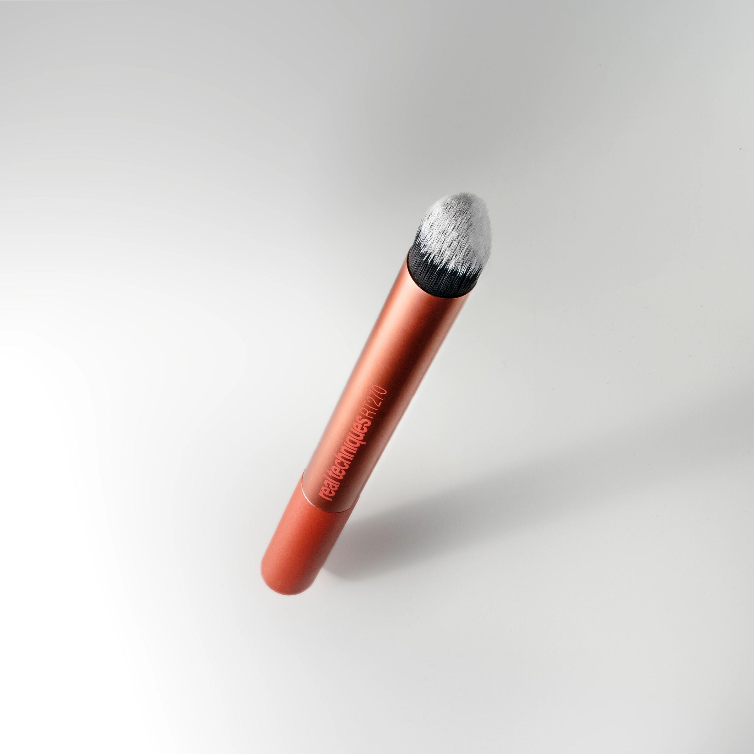 Real Techniques Spot Concealer Brush uses UltraPlush bristles for soft, shedding-free application.