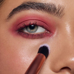 Real Techniques Spot Concealer Brush handles under-eye area for targeted color correction.