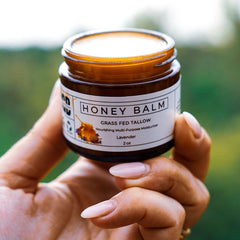 Really Good Blends balm being applied to the face for gentle moisturization.