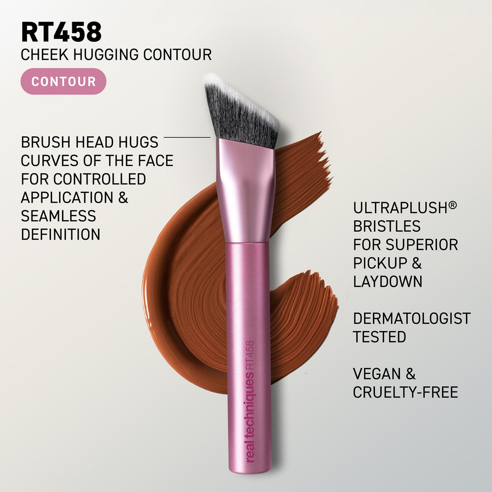 Real Techniques Cheek Hugging Contour Brush demonstrates precision placement on cheeks.