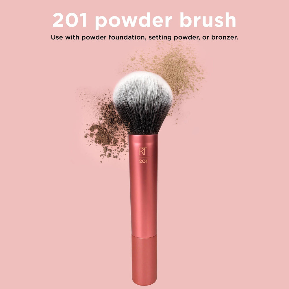Real Techniques brush shown with setting powders for a soft matte finish.
