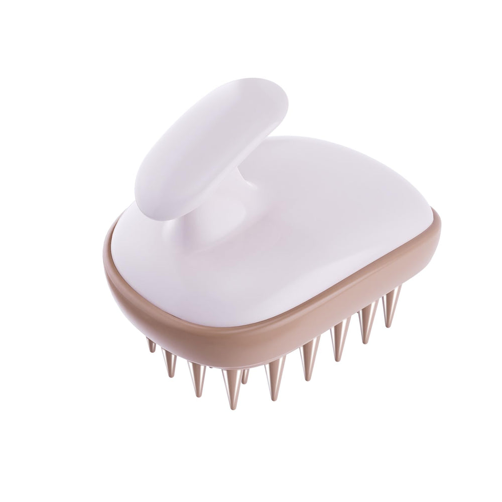 Rebex two-layer design shows inner exfoliating and outer gentle bristles for scalp care.