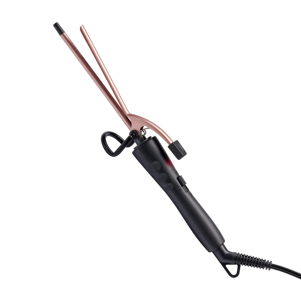 Red by Kiss RED pencil curler in action with fast heat-up for quick curls.