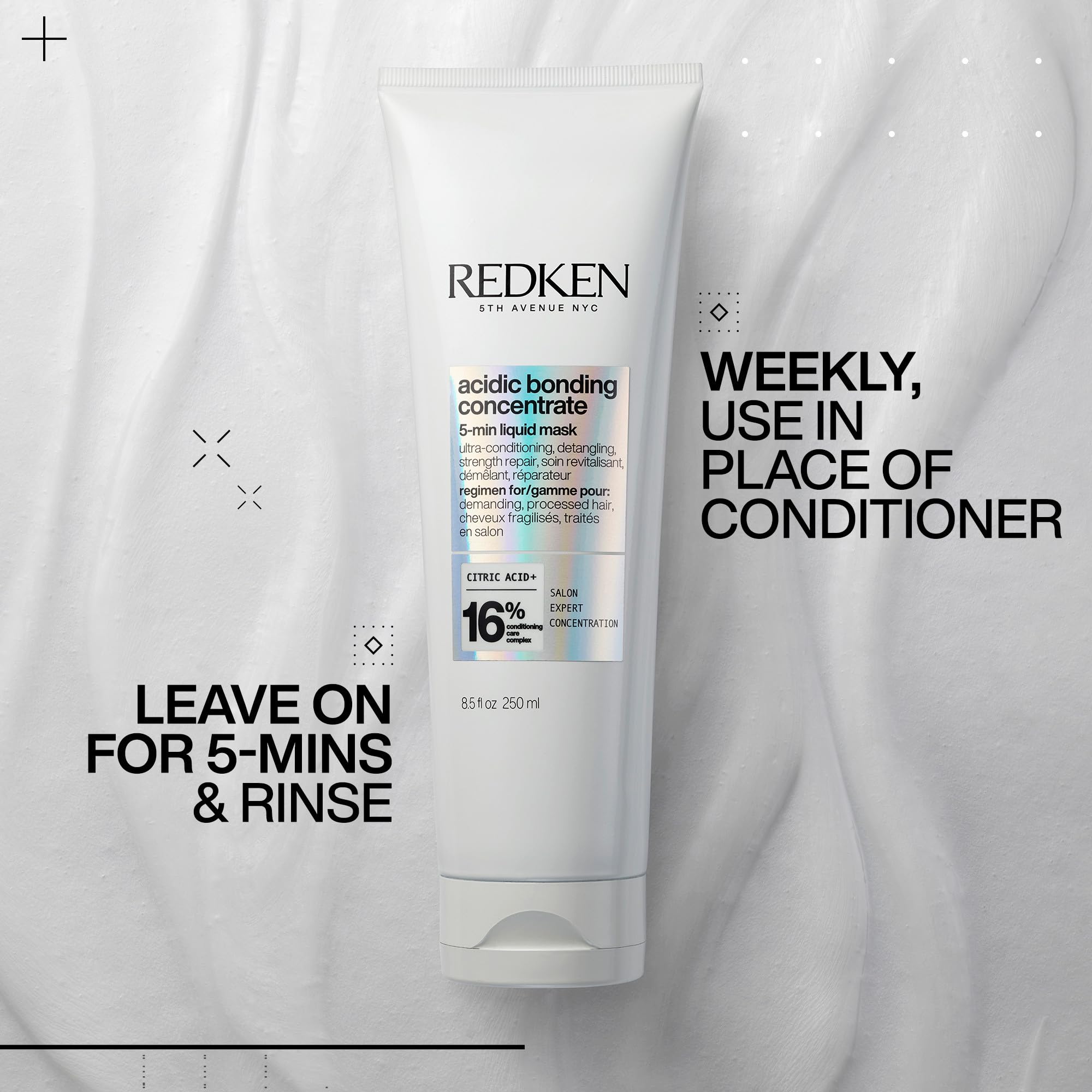 Redken mask applied to mid-lengths for targeted repair.