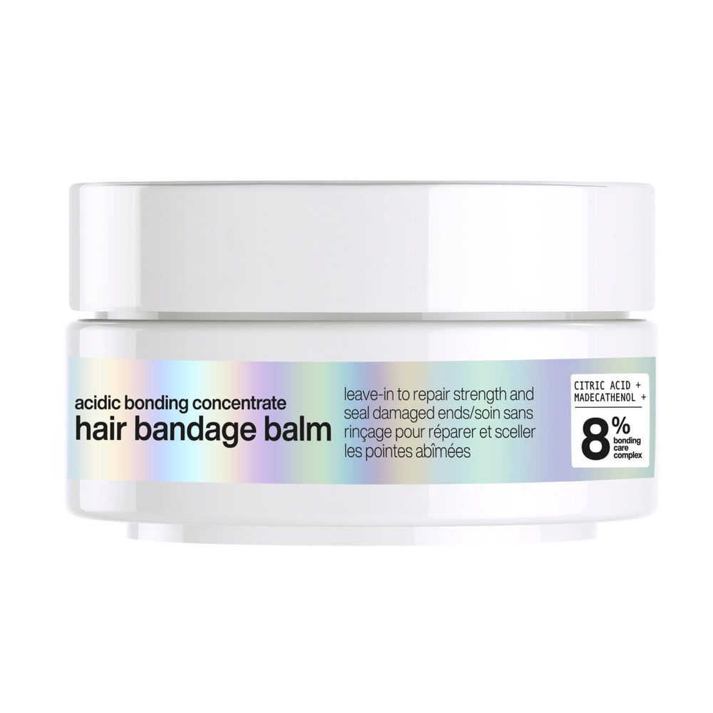 Redken Acidic Bonding Concentrate Balm packshot showing compact bottle for quick repair on the go