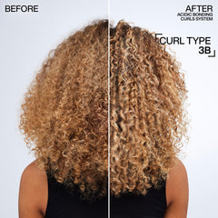 Applying Redken Leave-In helps detangle and define curls.