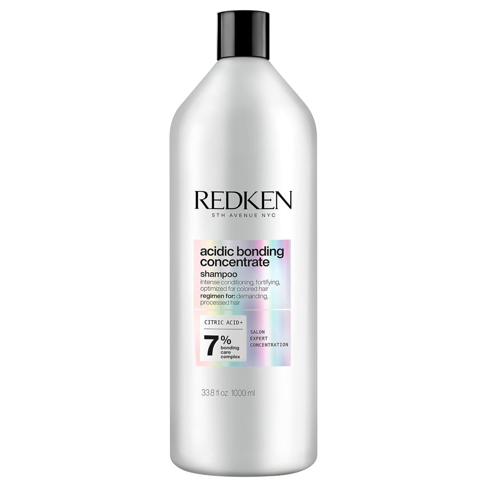 Redken Acidic Bonding Shampoo bottle showing vegan, sulfate-free formula for damaged hair.