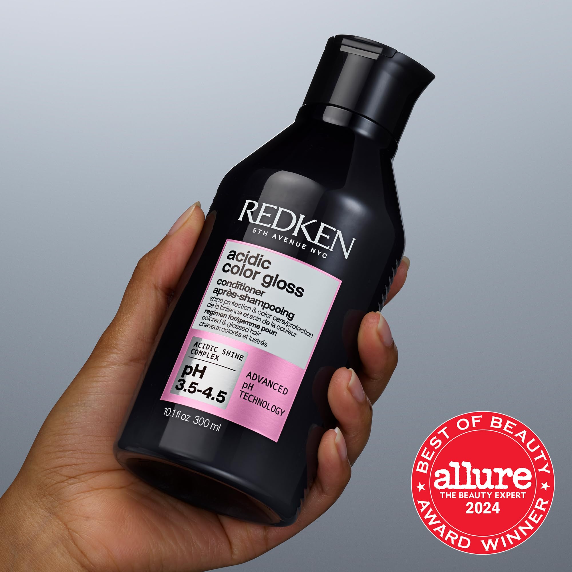 Texture closeup of Redken Acidic Color Gloss Conditioner showing creamy formula