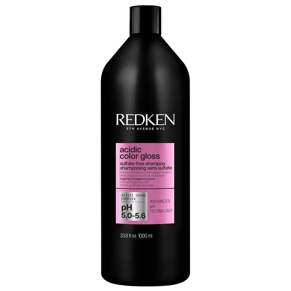 Redken Acidic Color Gloss shampoo bottle highlights shine protection for color-treated hair.