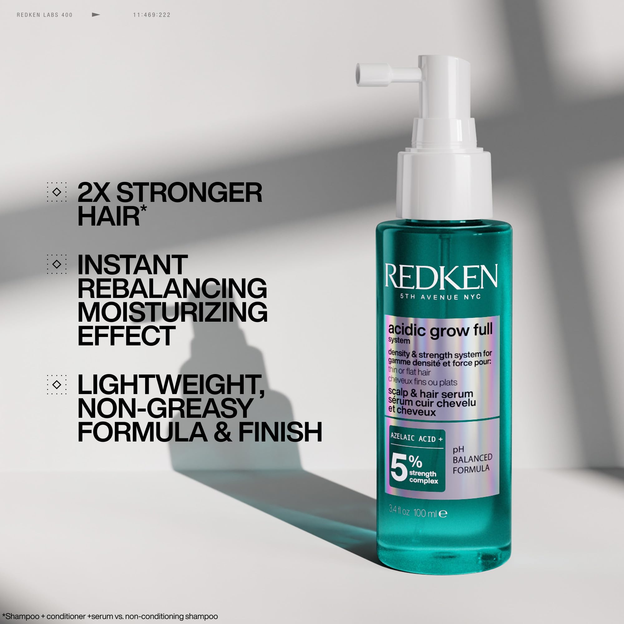 Redken densifying spray in view for instant root lift