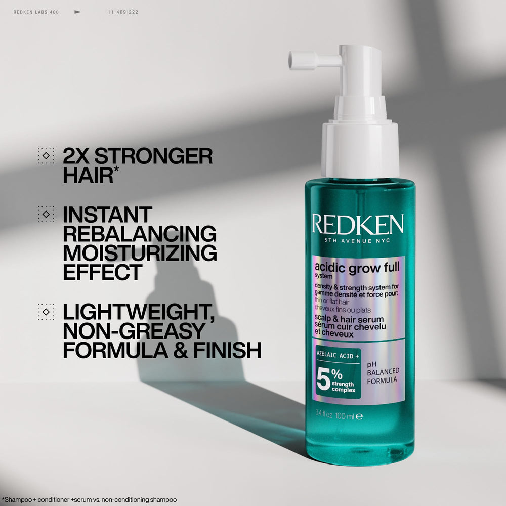 Redken densifying spray in view for instant root lift