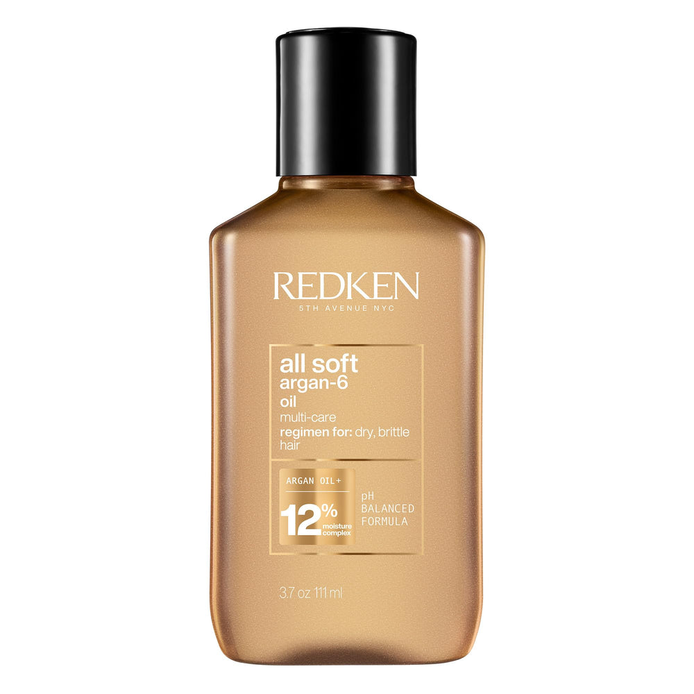 Redken All Soft Argan-6 Oil bottle shows premium packaging for moisture-rich conditioning.