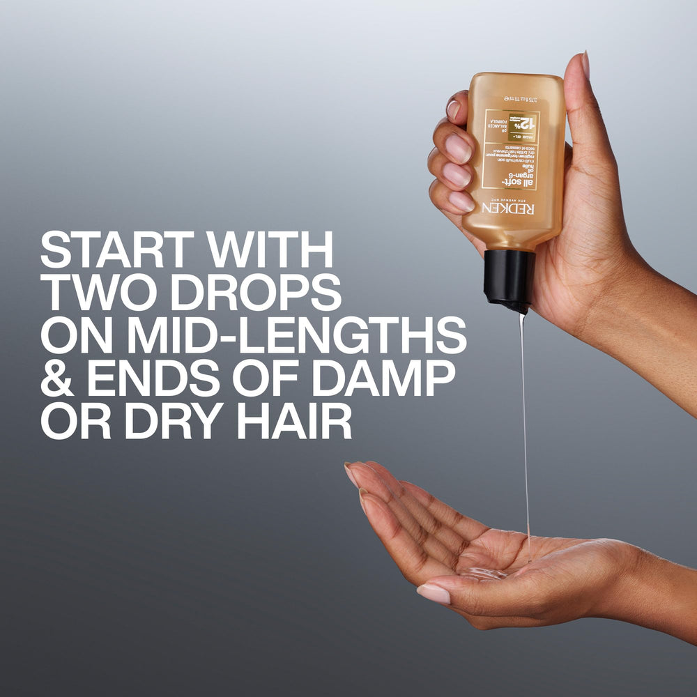 Oil applied to dry hair from Redken All Soft Argan-6 demonstrates softness and gloss.
