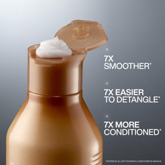 Redken All Soft conditioner argan oil bottle highlights nourishing formula for silky hair.