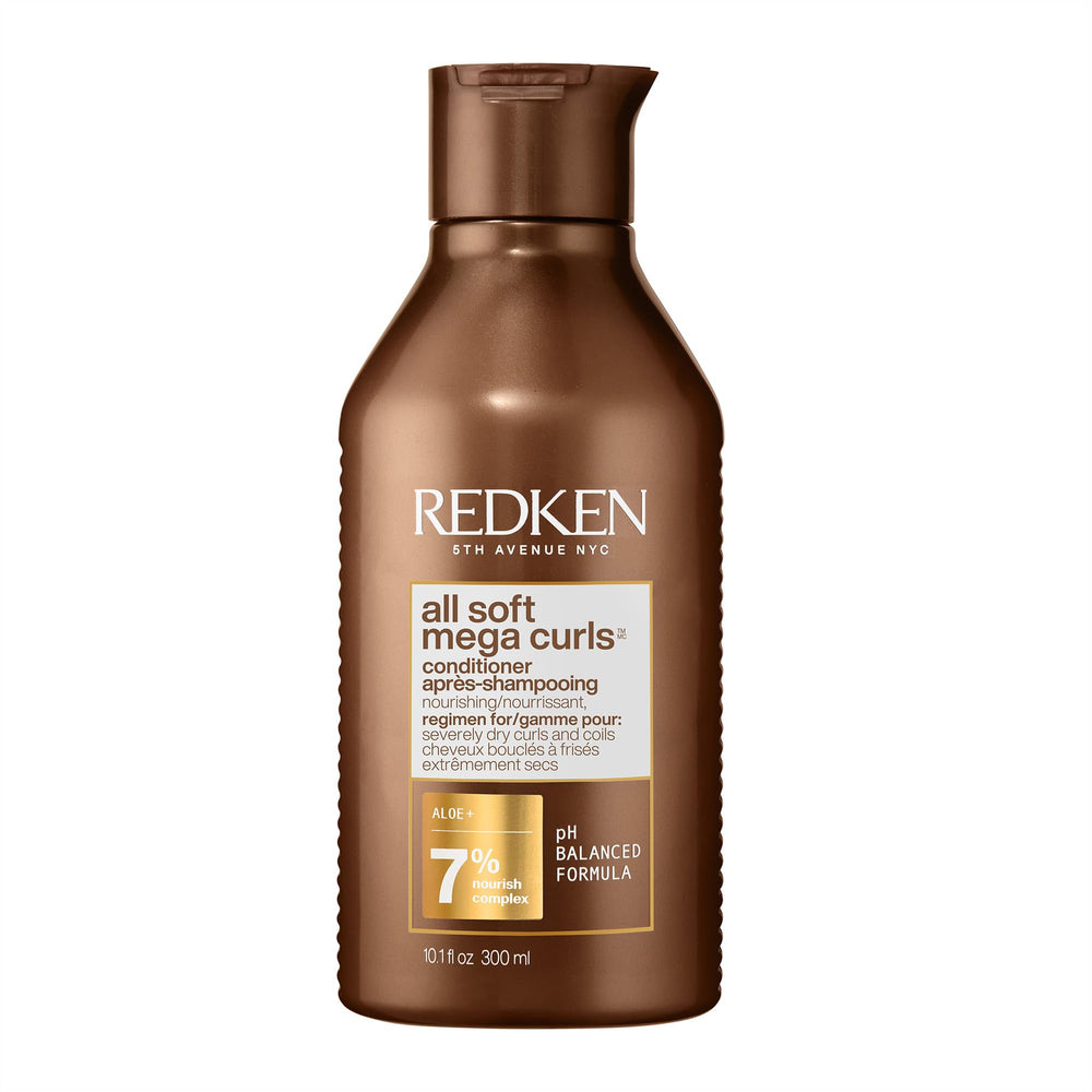 Redken All Soft Mega bottle closeup demonstrates deep hydration for dry hair.