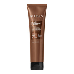 Redken All Soft Mega Hydramelt bottle pour showing easy application and deep hydration.