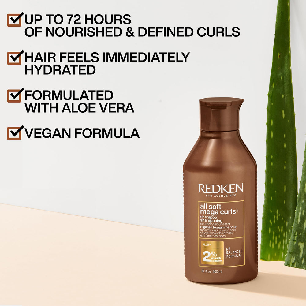 Redken All Soft Mega Curls Shampoo dispenser pump in action aiding easy application.