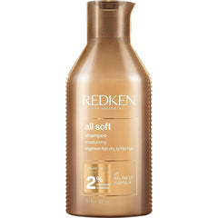 Redken All Soft Shampoo bottle with argan oil for hydrated, soft hair.