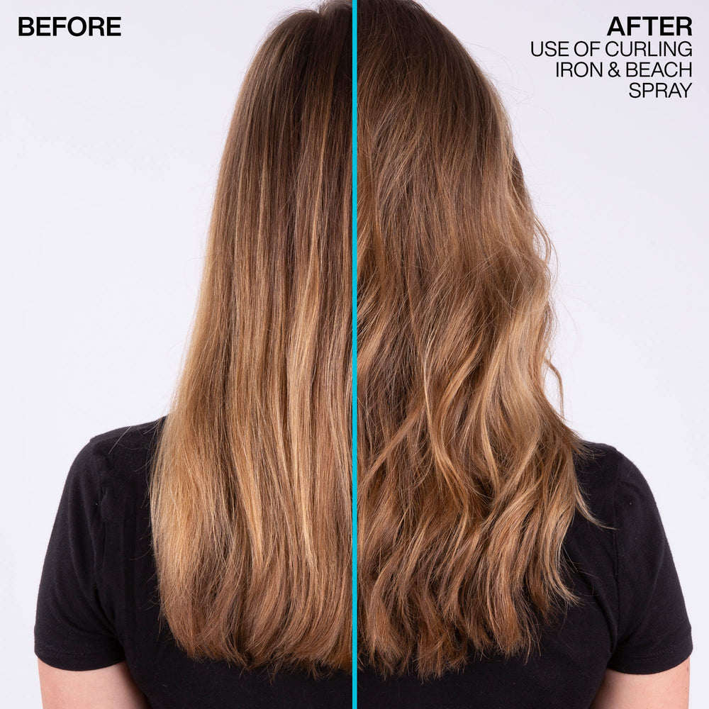 Hands applying Redken Beach Spray for texture and lift.