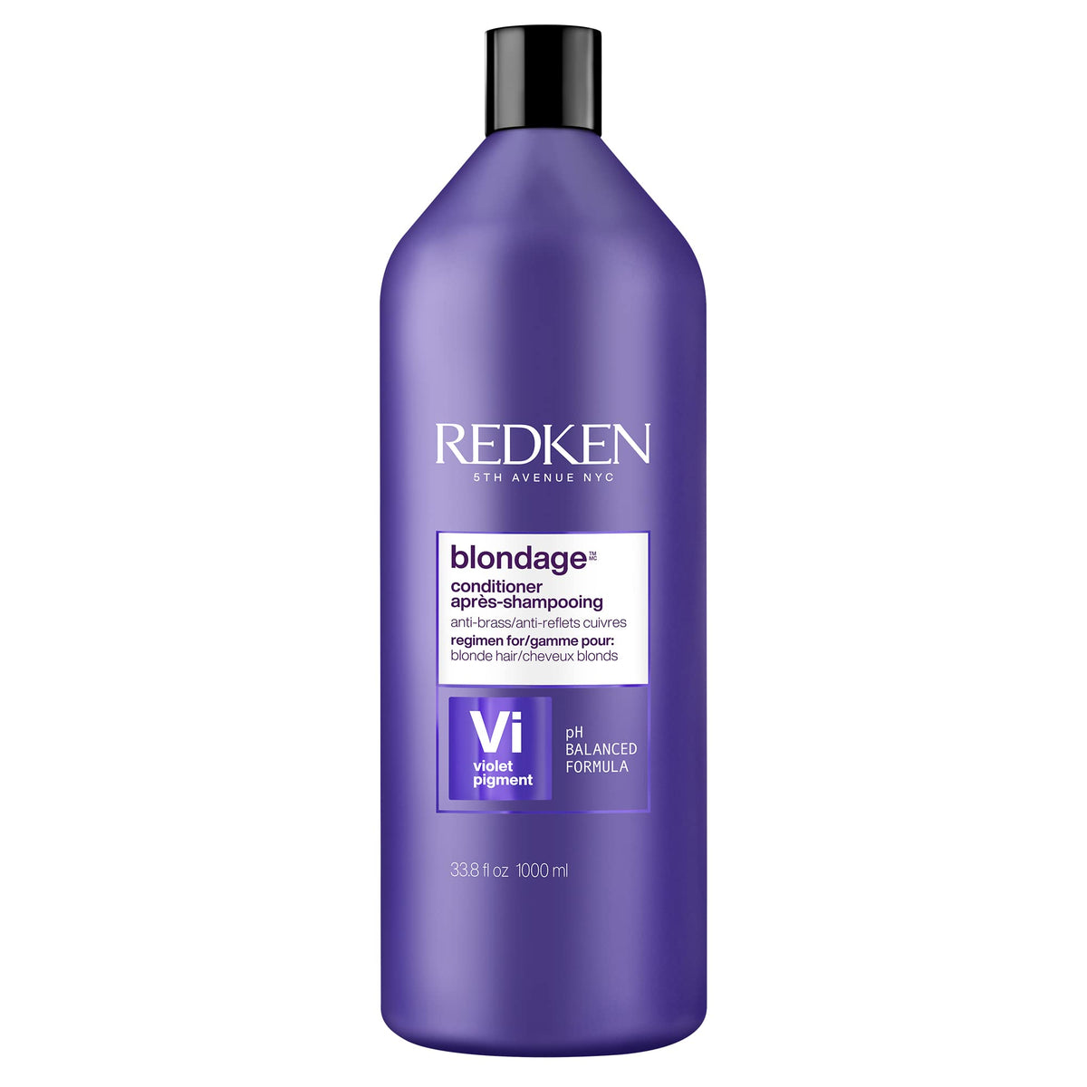 Redken Blondage bottle pour shows color-depositing action to neutralize brass.