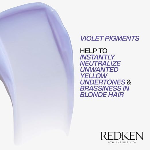 Redken Blondage Purple Conditioner on bathroom shelf with soft light.