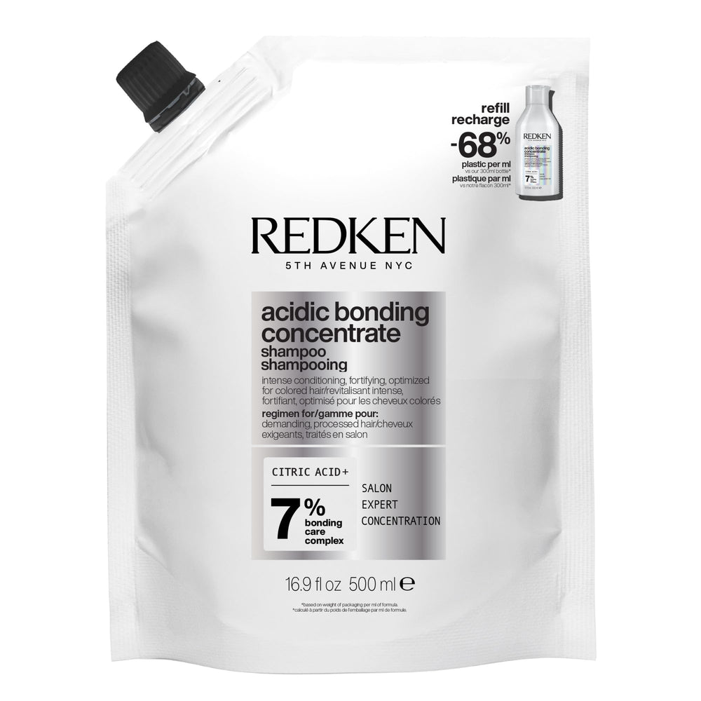 Redken Bonding Shampoo hero bottle reinforces damaged hair for added strength.