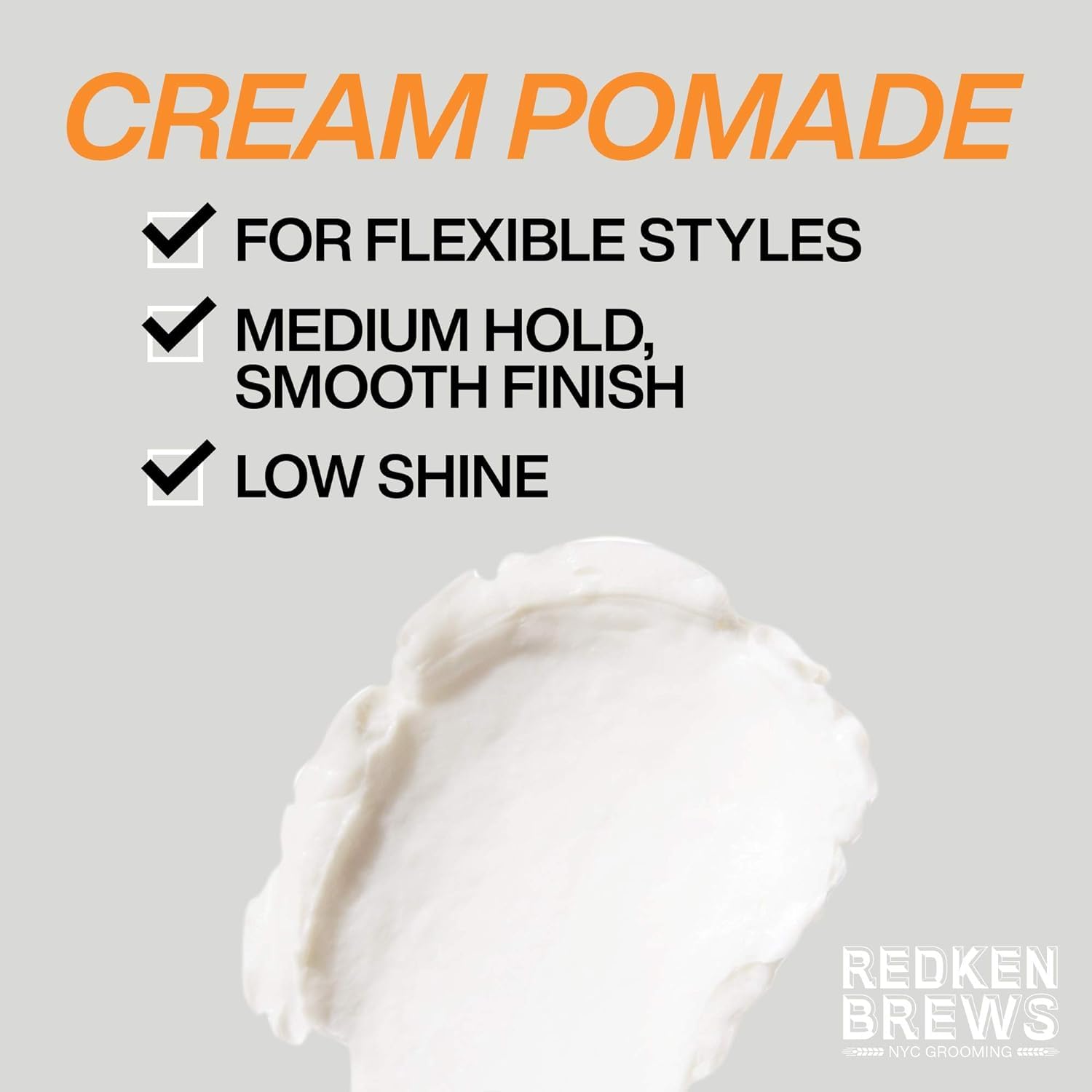 Redken Brews Cream Pomade on hair with a natural low-shine finish.