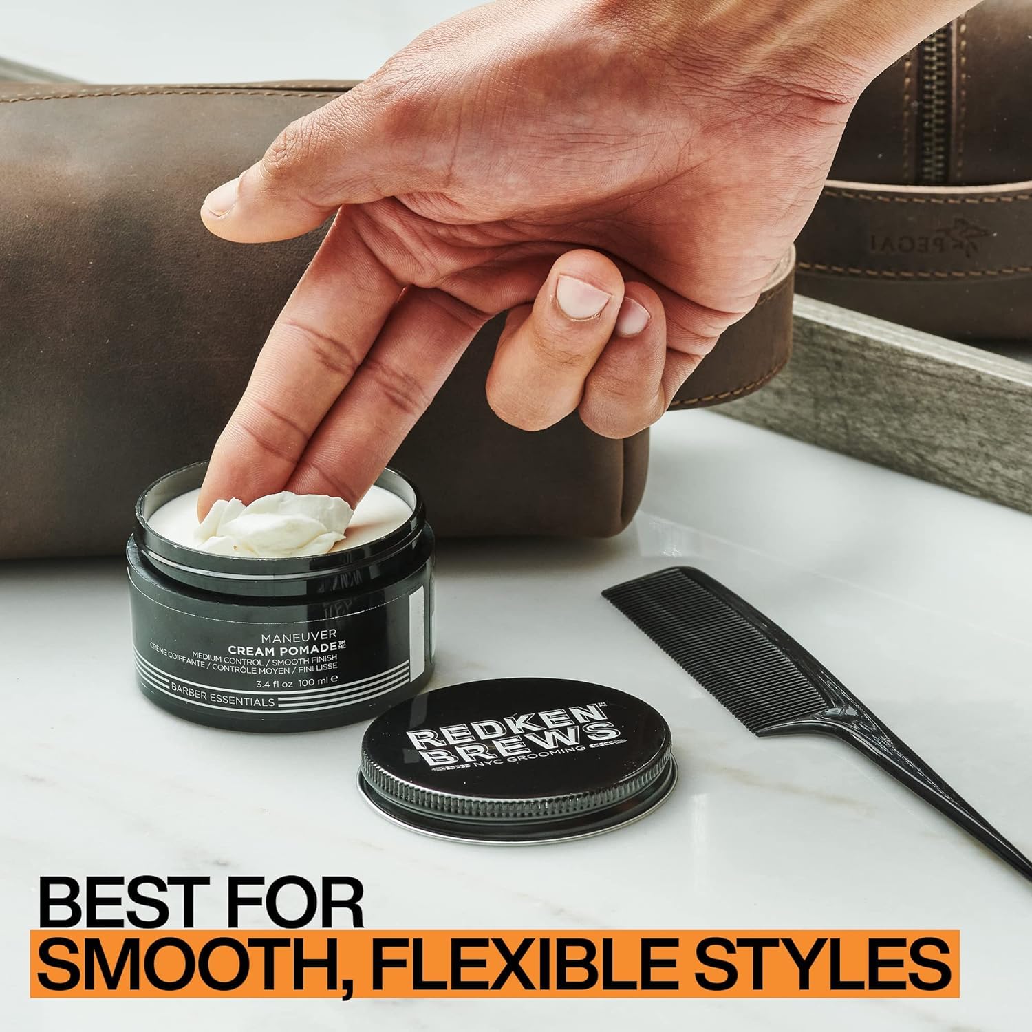 Redken Brews Cream Pomade in water-based formula adds texture and control.