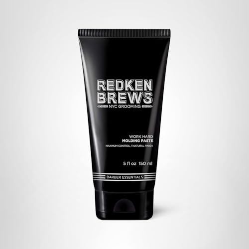 Model styling a defined, textured look with Redken Brews Molding Paste.