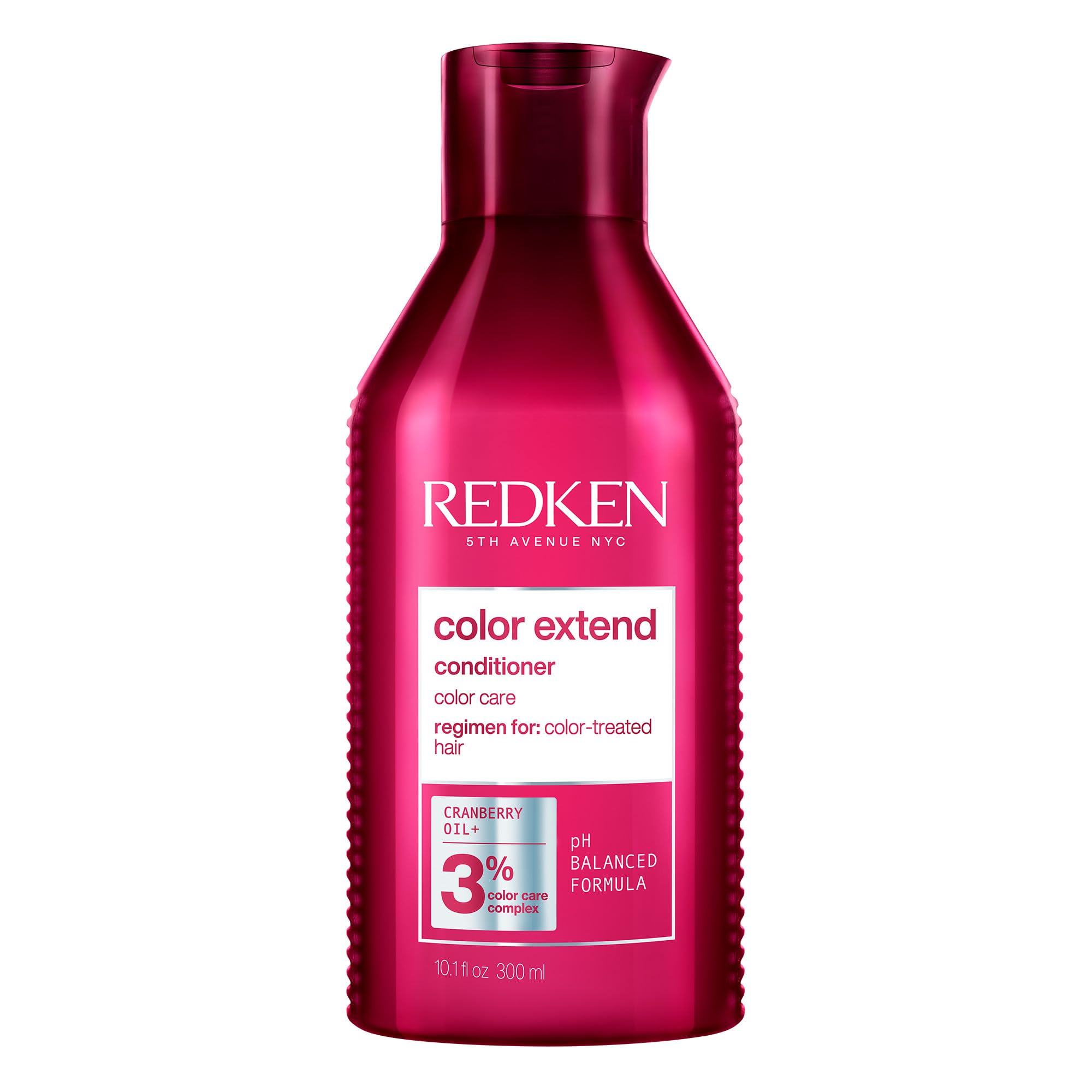 Redken Color Extend Magnetics conditioner bottle pour shows color-safe nourishment.