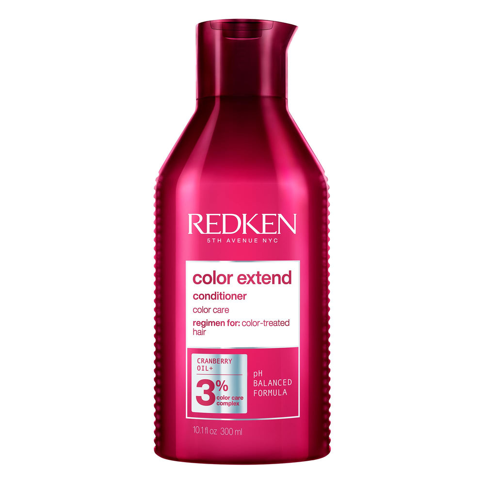 Redken Color Extend Magnetics conditioner bottle pour shows color-safe nourishment.