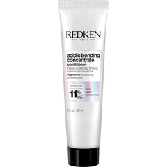 Redken Concentrado Enlace Ácido: botella con dosificador para aplicación precisa.