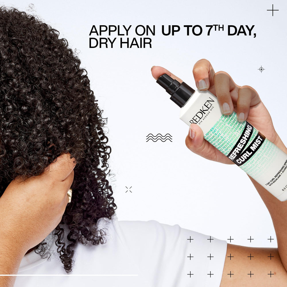 Redken Curl Refreshing Mist helps reduce frizz for defined curls.