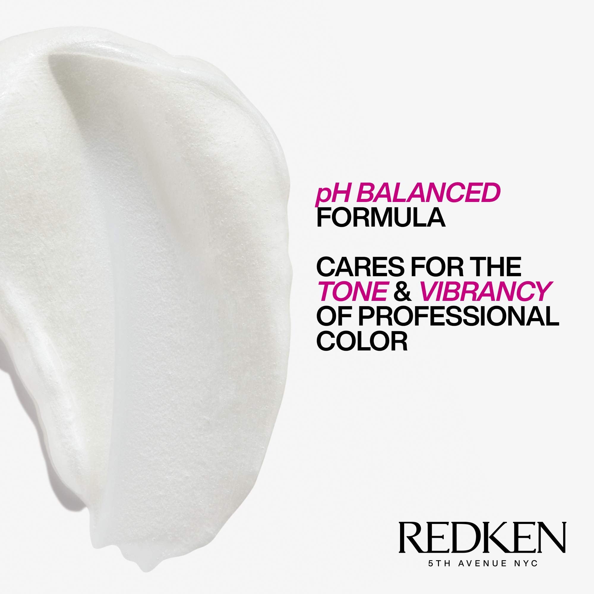 Redken Extend Magnetics conditioner massaging into damp hair for conditioning.