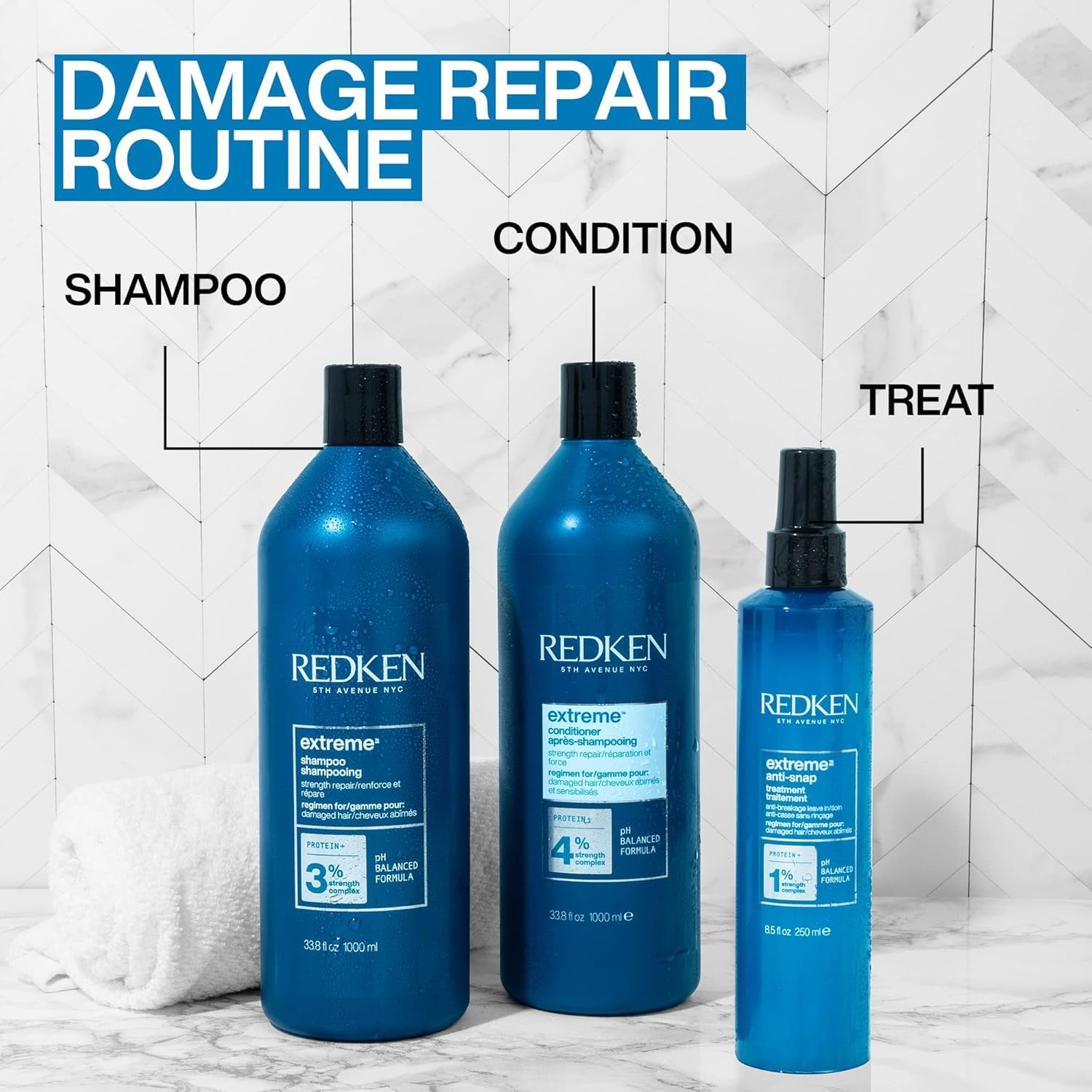 Redken Extreme Conditioner packaging on a bathroom shelf ready for routines.