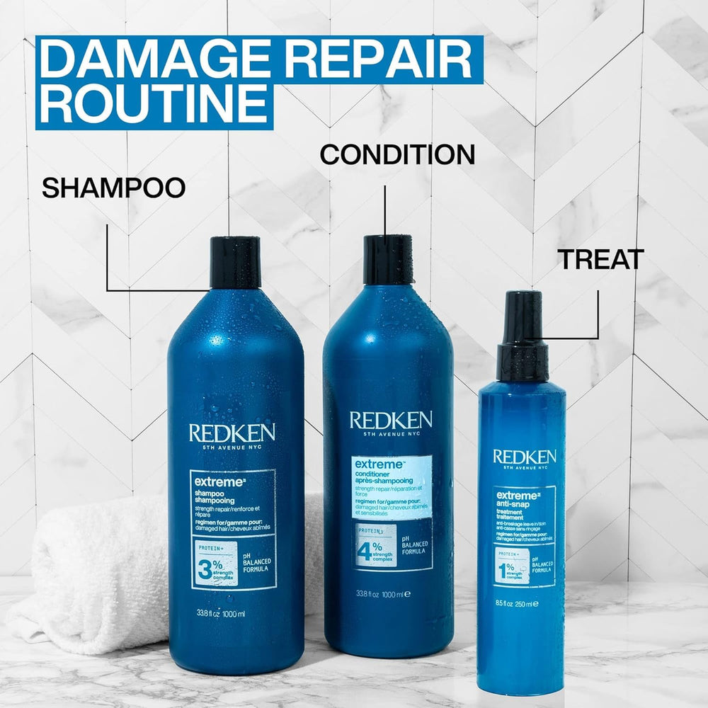Redken Extreme Conditioner packaging on a bathroom shelf ready for routines.
