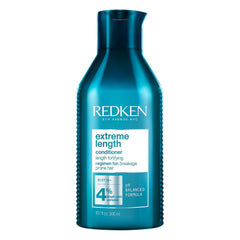 Redken Extreme Length Conditioner bottle front showing biotin-rich formula for stronger, longer hair.