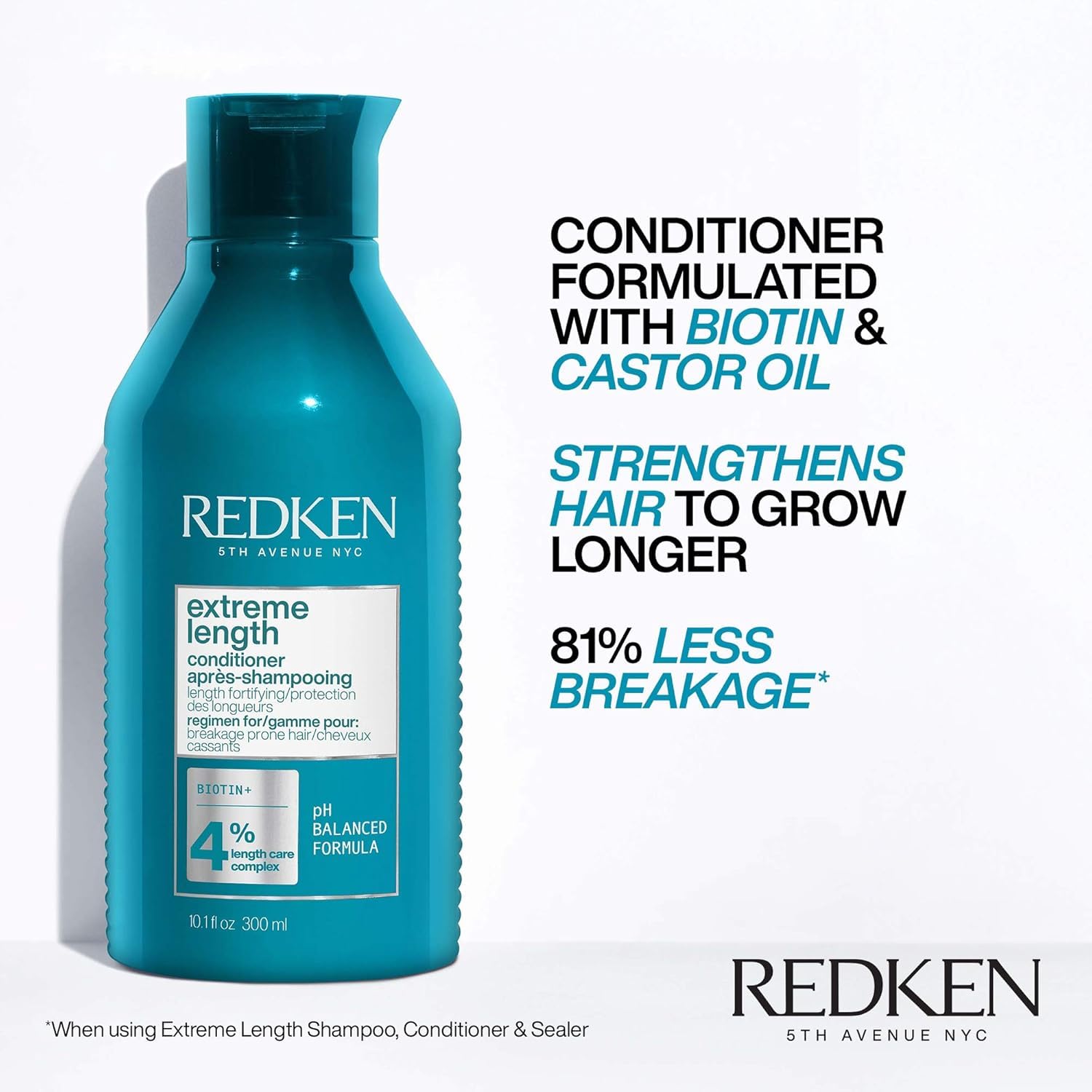 Redken Extreme Length Conditioner label detail with biotin and castor oil benefits.