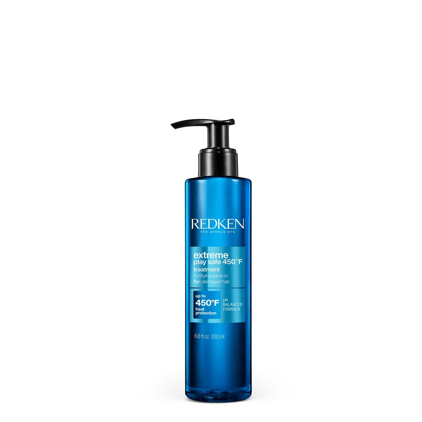 Redken Extreme Play Safe bottle pour demonstrates easy heat protection for all hair types