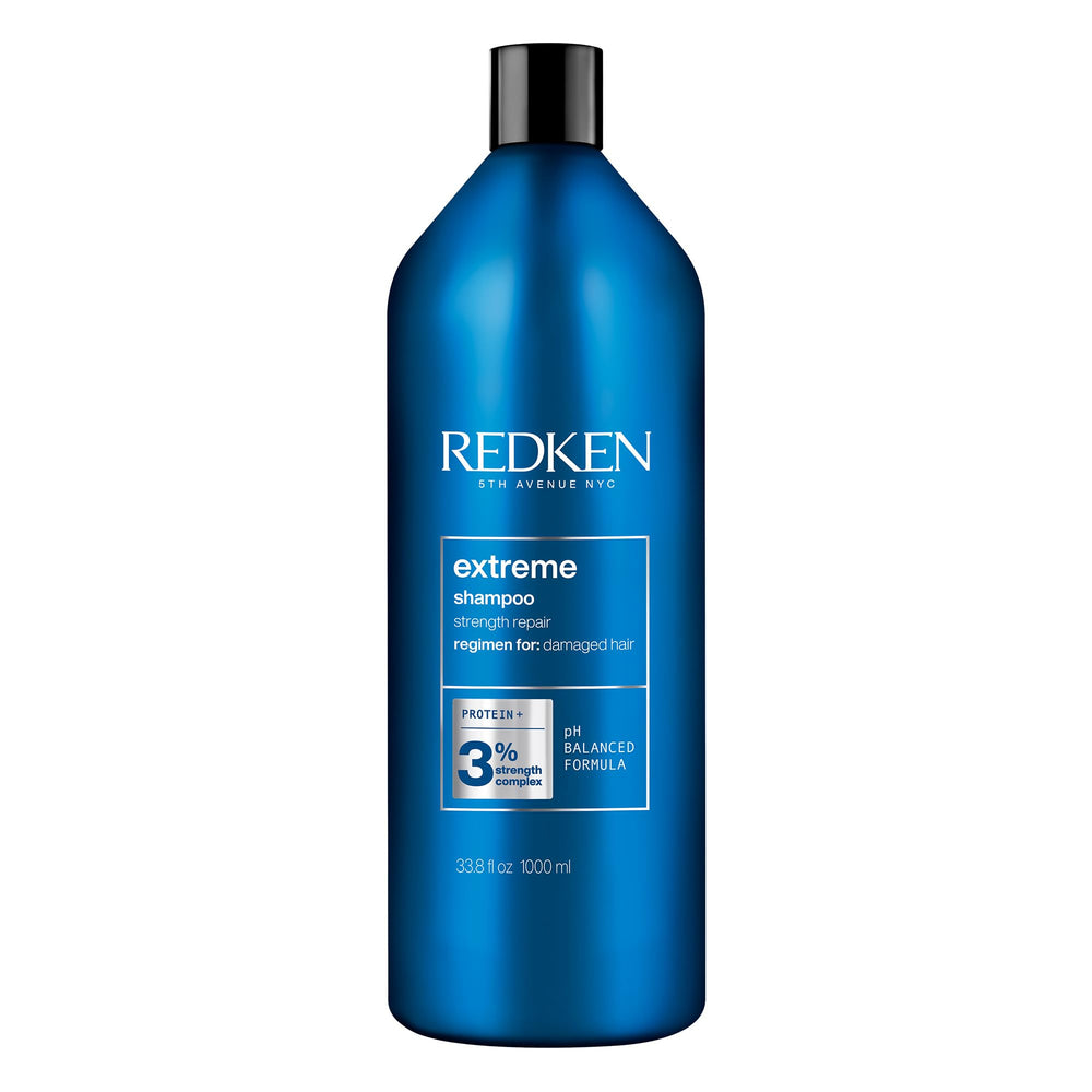 Redken Extreme Shampoo bottle front, showcasing strength and repair for damaged hair.