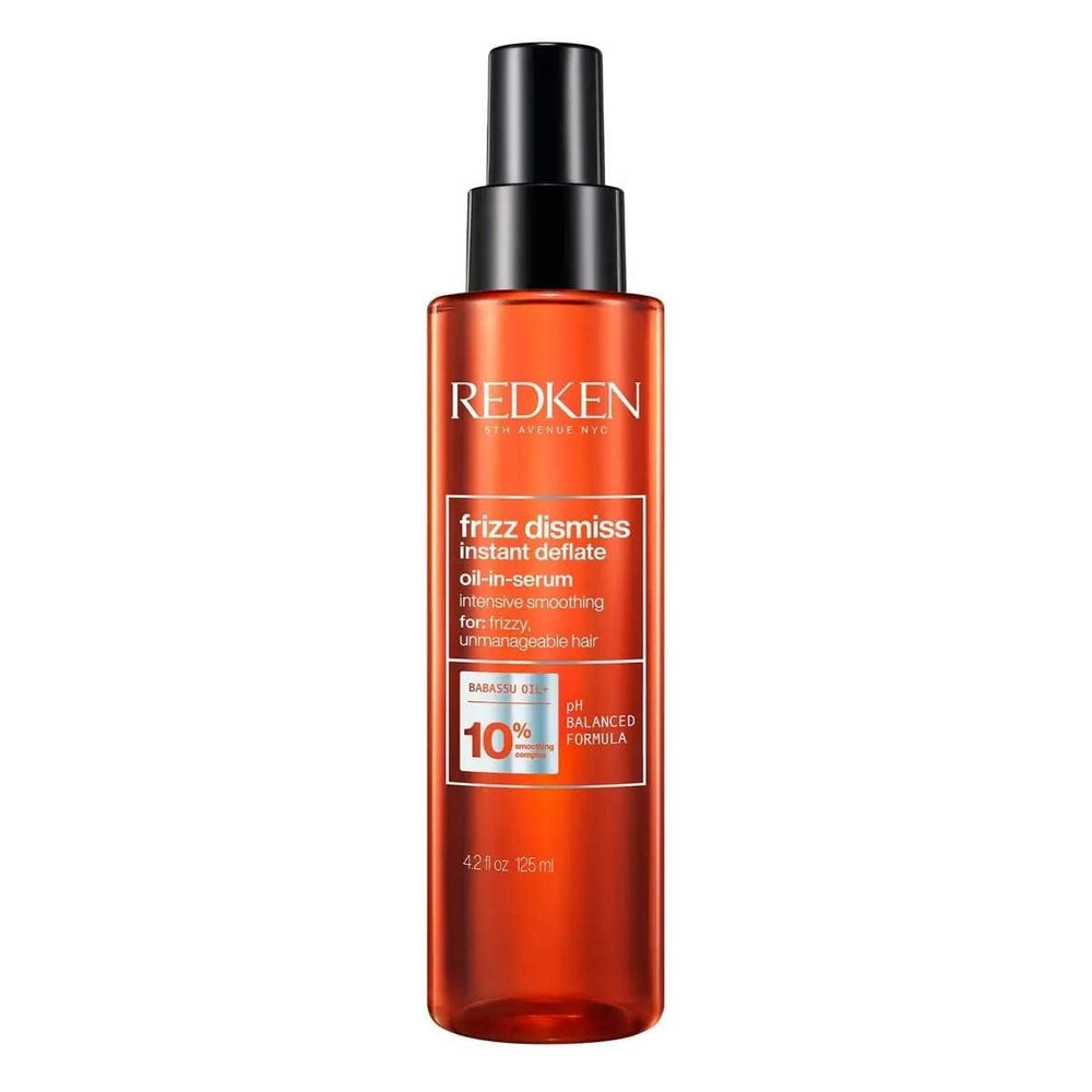 Redken Frizz Dismiss Instant Deflate bottle front for smooth frizz-controlled hair.