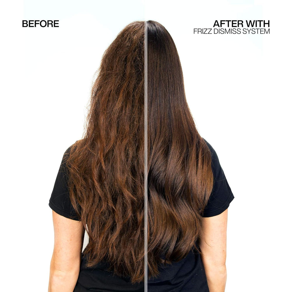 Redken Frizz Dismiss Instant Deflate serum drop on hair for nourishment.