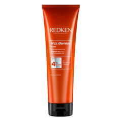 Redken Frizz Dismiss Mask bottle highlighting smoothing technology for frizz-prone hair