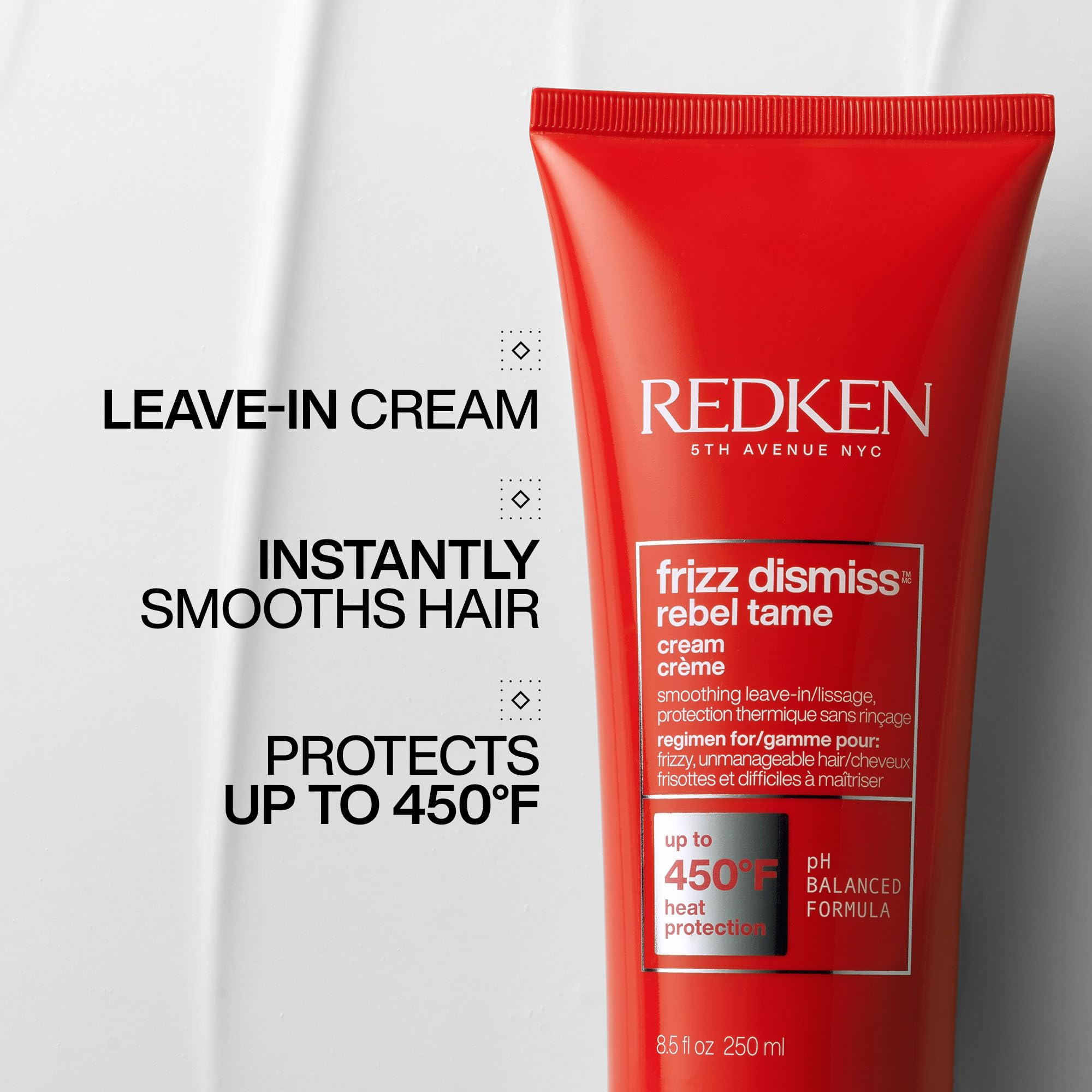 Close-up of Redken Frizz Dismiss Rebel Tame pump for easy application and control